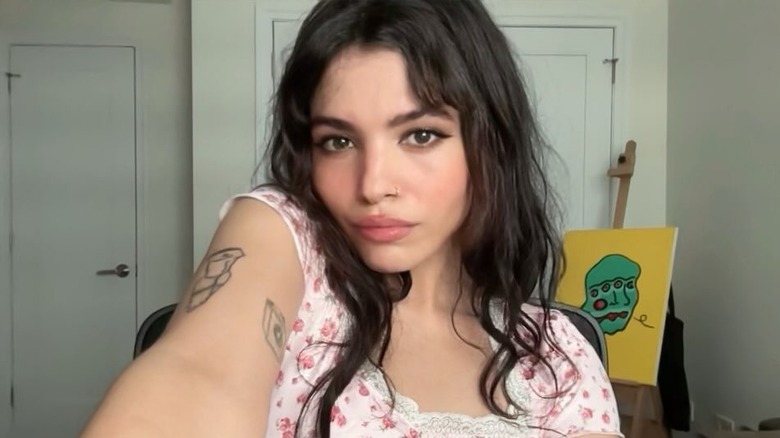 Lexi Jones takes a selfie in her room