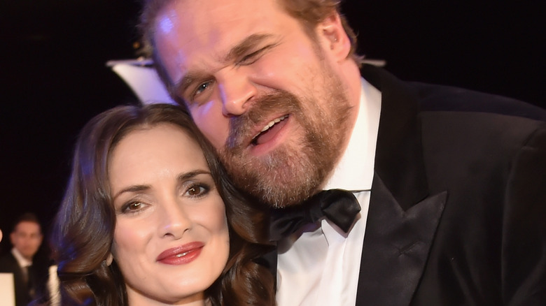 Winona Ryder and David Harbour hugging