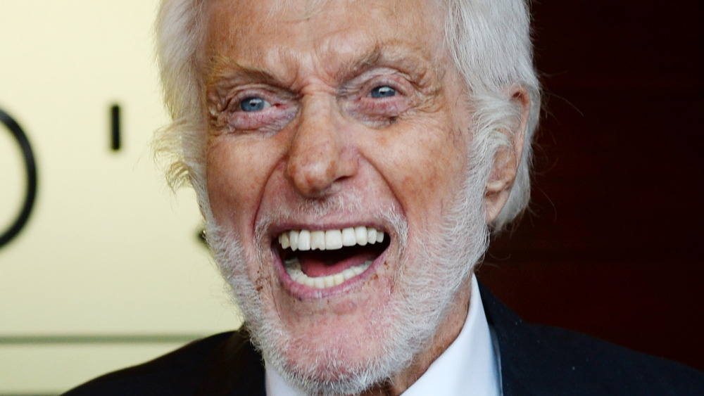 Dick Van Dyke smiling at a assembly