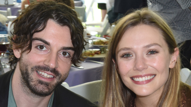 Elizabeth Olsen and Robbie Arnett at a restaurant