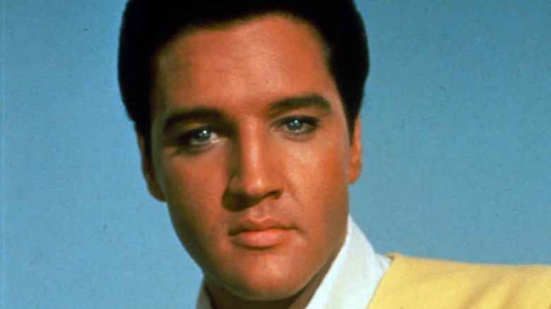 Elvis posing for a picture