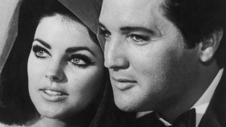 Elvis and Priscilla Presley black and white closeup