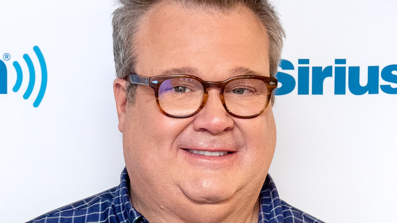 Eric Stonestreet smiles on the red carpet