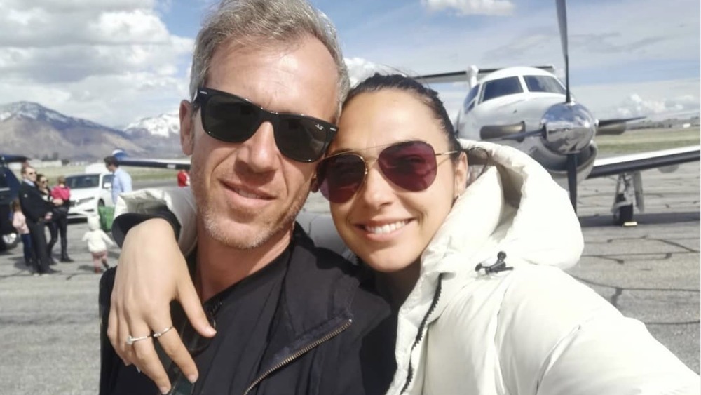 Gal Gadot and Jaron Varsano by a plane