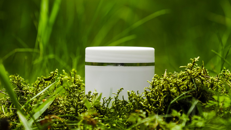 Cosmetic product in grass