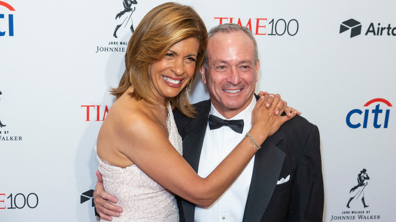 Hoda Kotb with her arms around Joel Schiffman