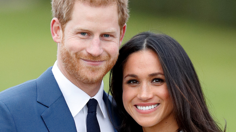 Prince Harry and Meghan Markle at an event. 