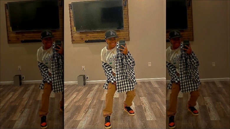 Jalaiah Harmon posing in a studio
