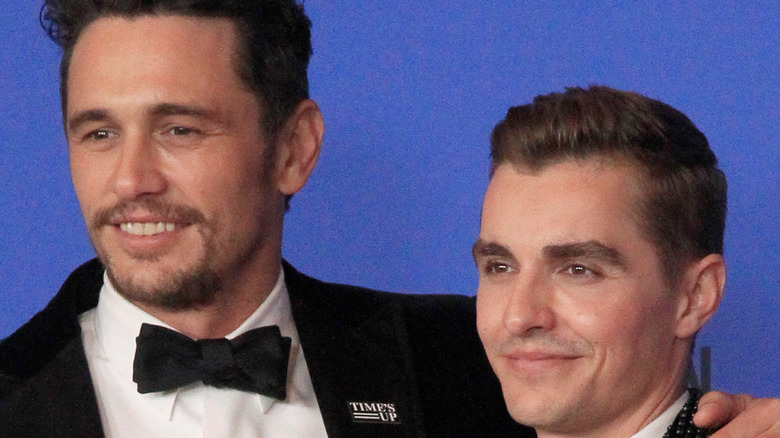 Brothers Dave and James Franco pose in tuxedos