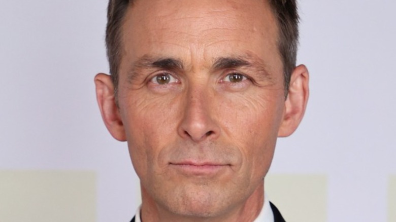 James Patrick Stuart posing on red carpet