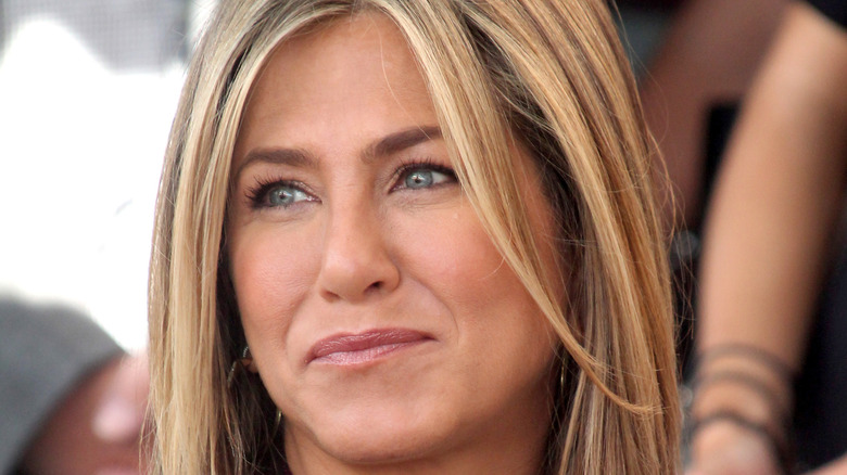 Jennifer Aniston looking off to side