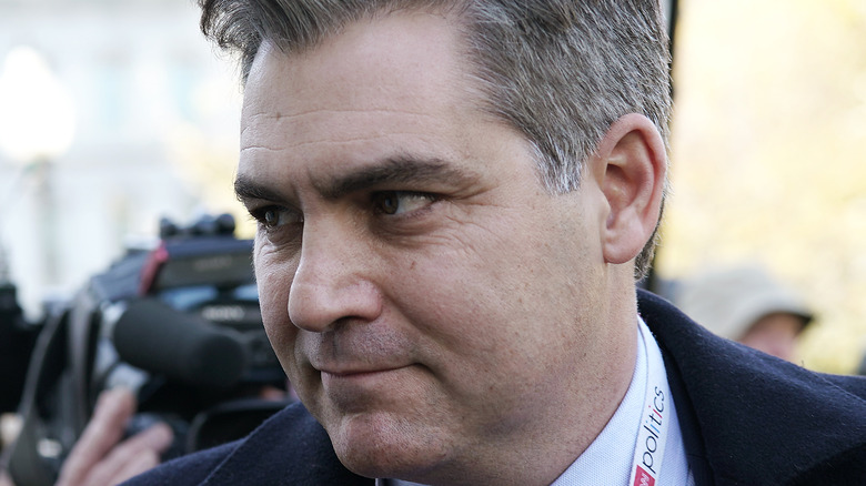 Jim Acosta entering work  