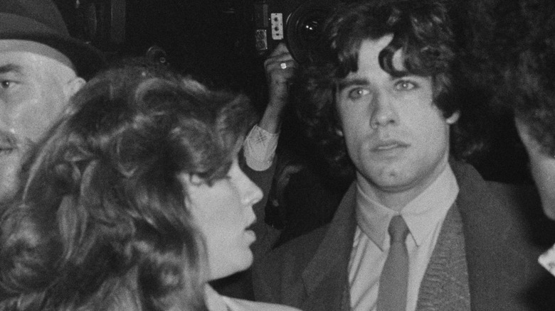 John Travolta and Marilu Henner