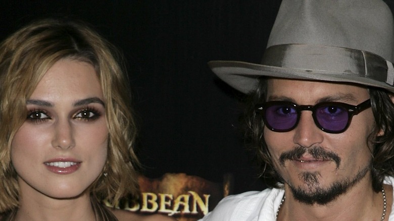 Johnny Depp and Keira Knightley smiling