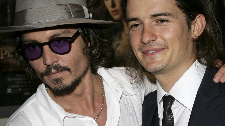 Orlando Bloom and Johnny Depp at event