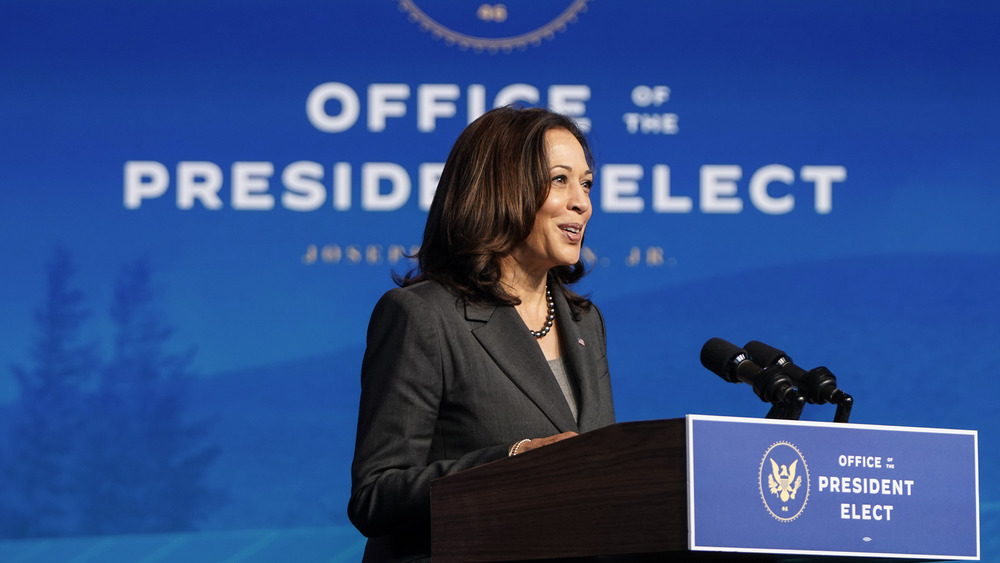 Kamala Harris speaks at a podium