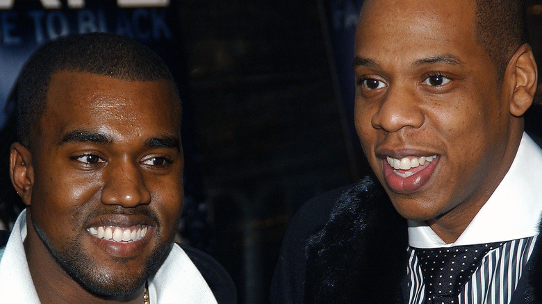 Kanye West and Jay-Z smiling