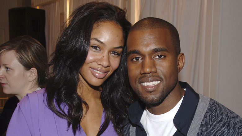 Alexis Phifer and Kanye West smiling