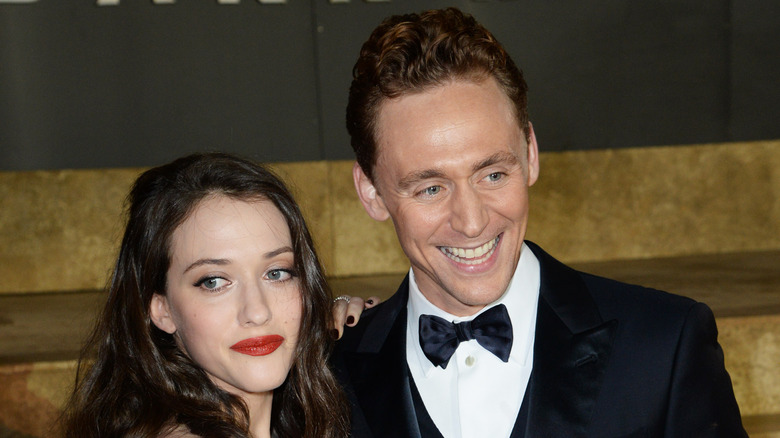 Kat Dennings and Tom Hiddleston at event