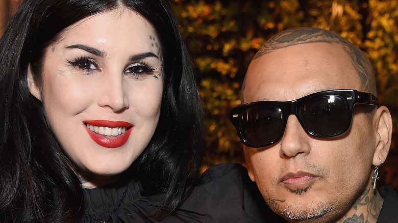 Kat Von D and Rafael Reyes pose together at an event