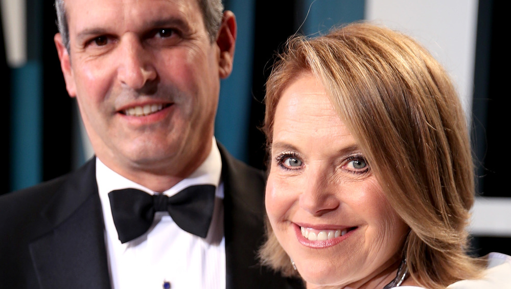 Katie Couric and John Molner close up and smiling