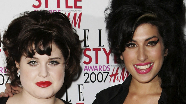 Kelly Osbourne and Amy Winehouse photographed at an event in 2007