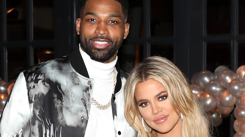 Khloe Kardashian and Tristan Thompson at an event 