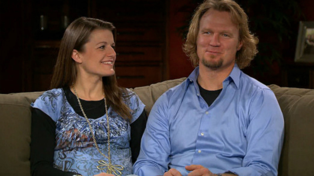 Kody and Robyn Brown wearing blue shirts