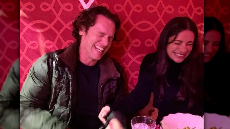 Jonathan Groff and Lea Michele laughing