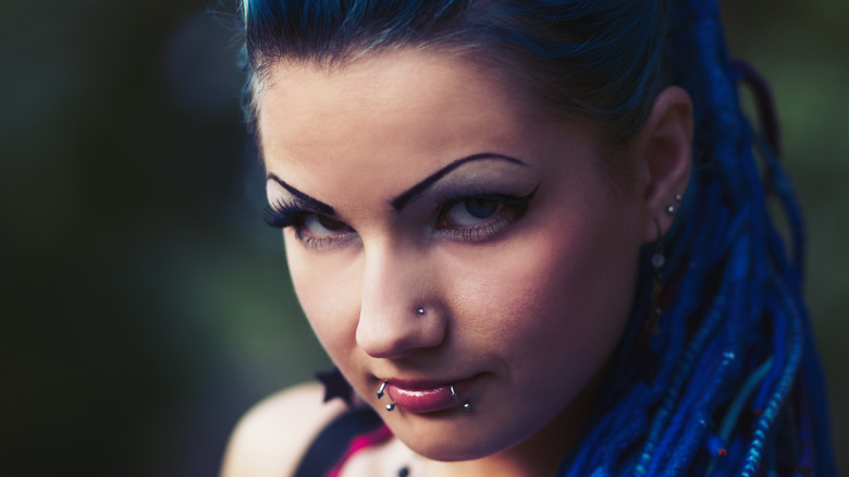 Woman with lip piercings