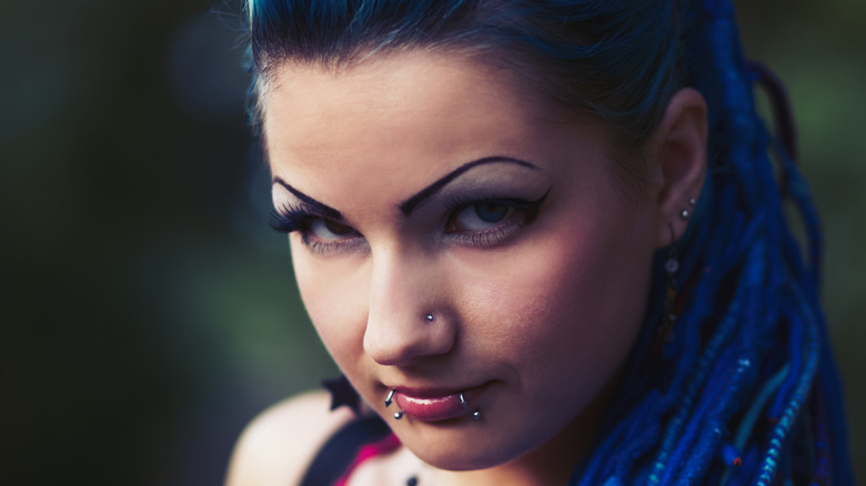 Woman with lip piercings