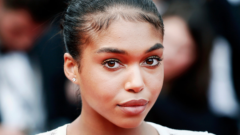 Lori Harvey poses on the red carpet