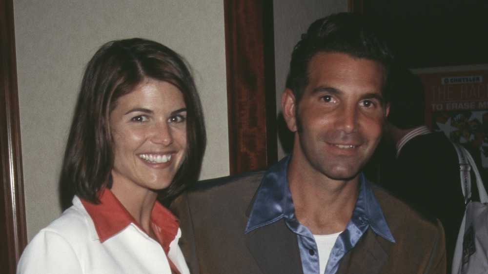 Lori Loughlin and Mossimo Giannulli in the '90s, smiling