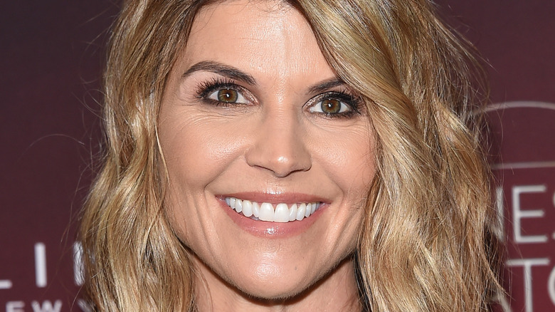 Lori Loughlin smiles