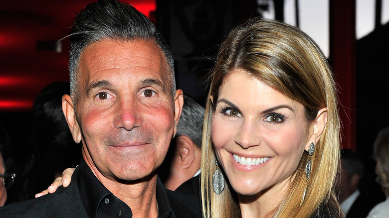 Lori Loughlin and Mossimo Giannulli at an event.