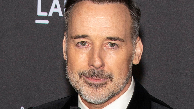 David Furnish posing at LACMA Art + Film Gala