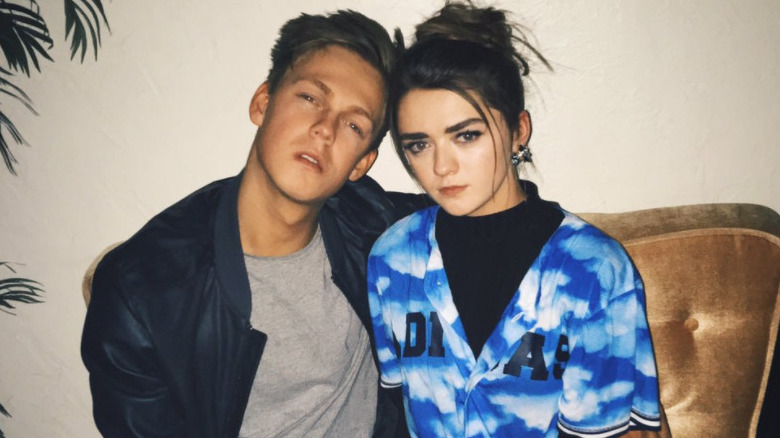 Casper Lee and Maisie Williams posing