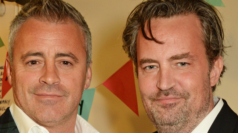 Matt LeBlanc and Matthew Perry posing at event