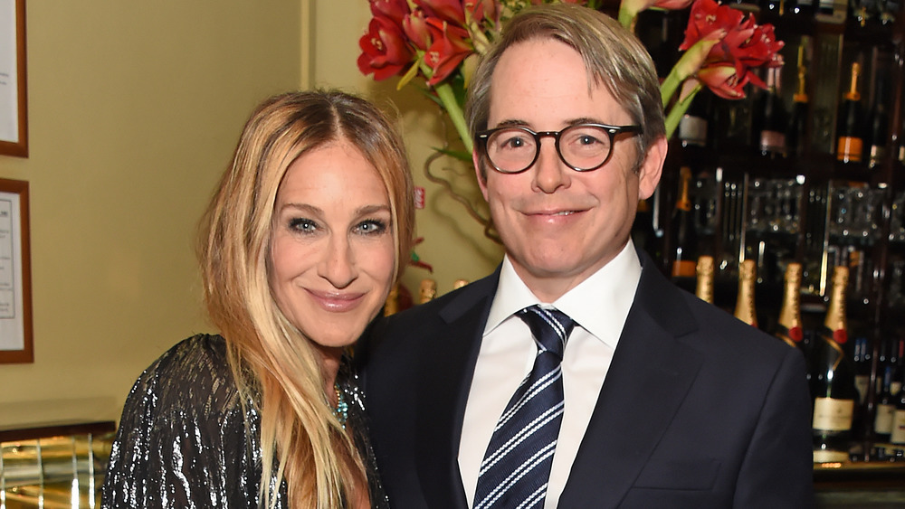 Sarah Jessica Parker and Matthew Broderick, smiling while posing arm in arm