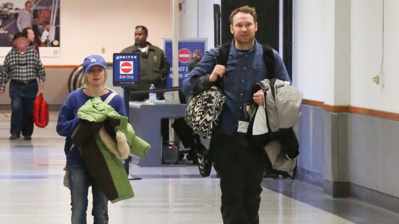 Melissa Rauch and Winston Rauch walking