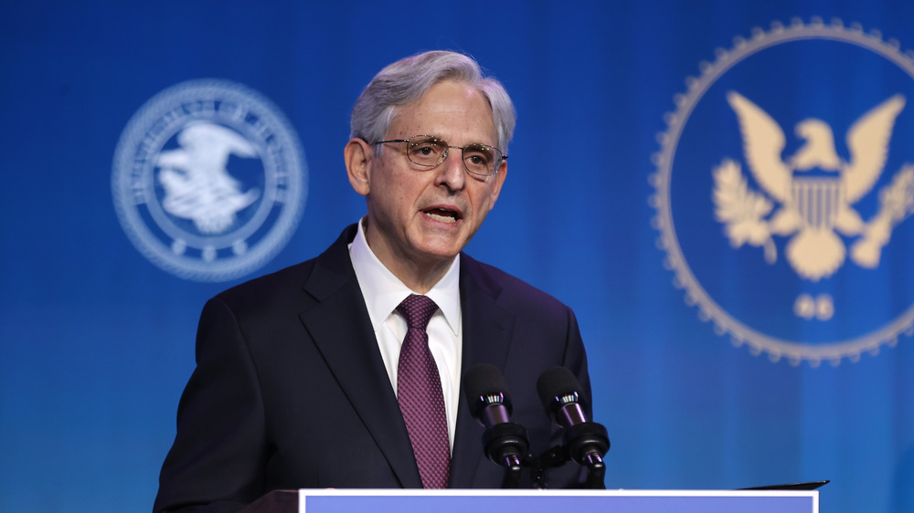 Merrick Garland speaking at podium