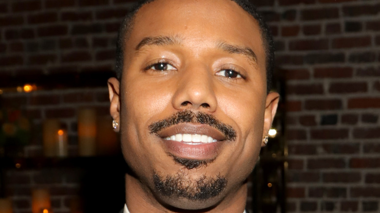 Michael B. Jordan smiles on the red carpet