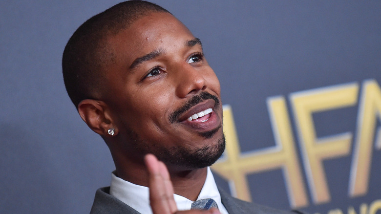 Michael B. Jordan does the peace sign