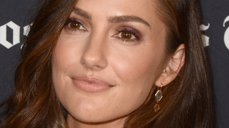 Minka Kelly smiles