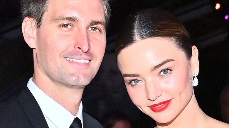 Evan Spiegel, Miranda Kerr smiling 