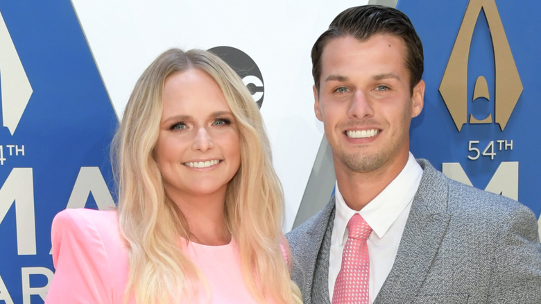Miranda Lambert and Brendan McLoughlin wearing pink