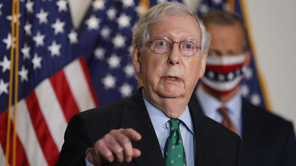 Mitch McConnell with American flags