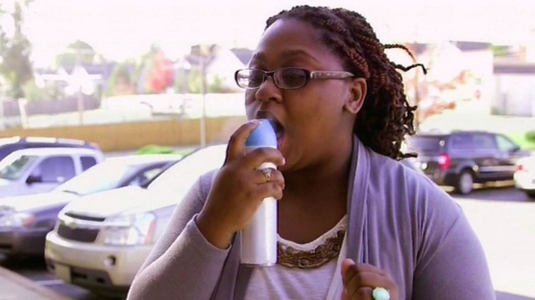 A woman huffing on "My Strange Addiction"