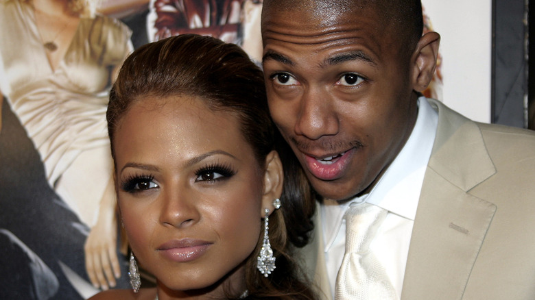 Nick Cannon and Christina Milian pose on the red carpet together