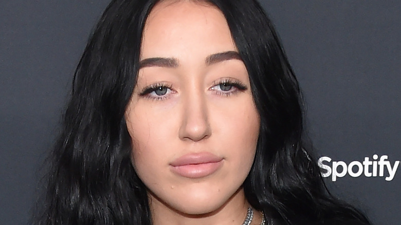 Noah Cyrus poses on the red carpet
